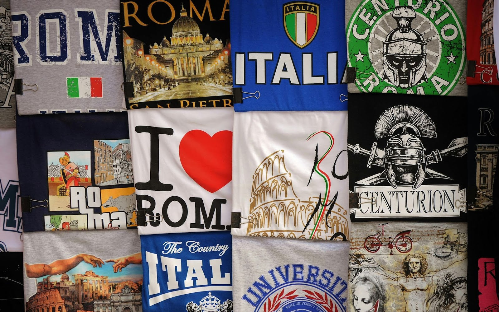 An array of vibrant graphic T-shirts featuring bold prints and designs, showcasing unique streetwear outfits and artistic expressions.